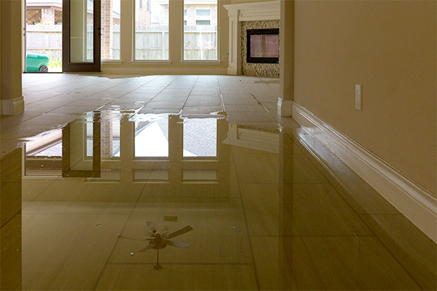 Flooded interior floor reflecting the room above